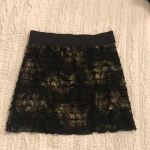 Black and gold mini skirt